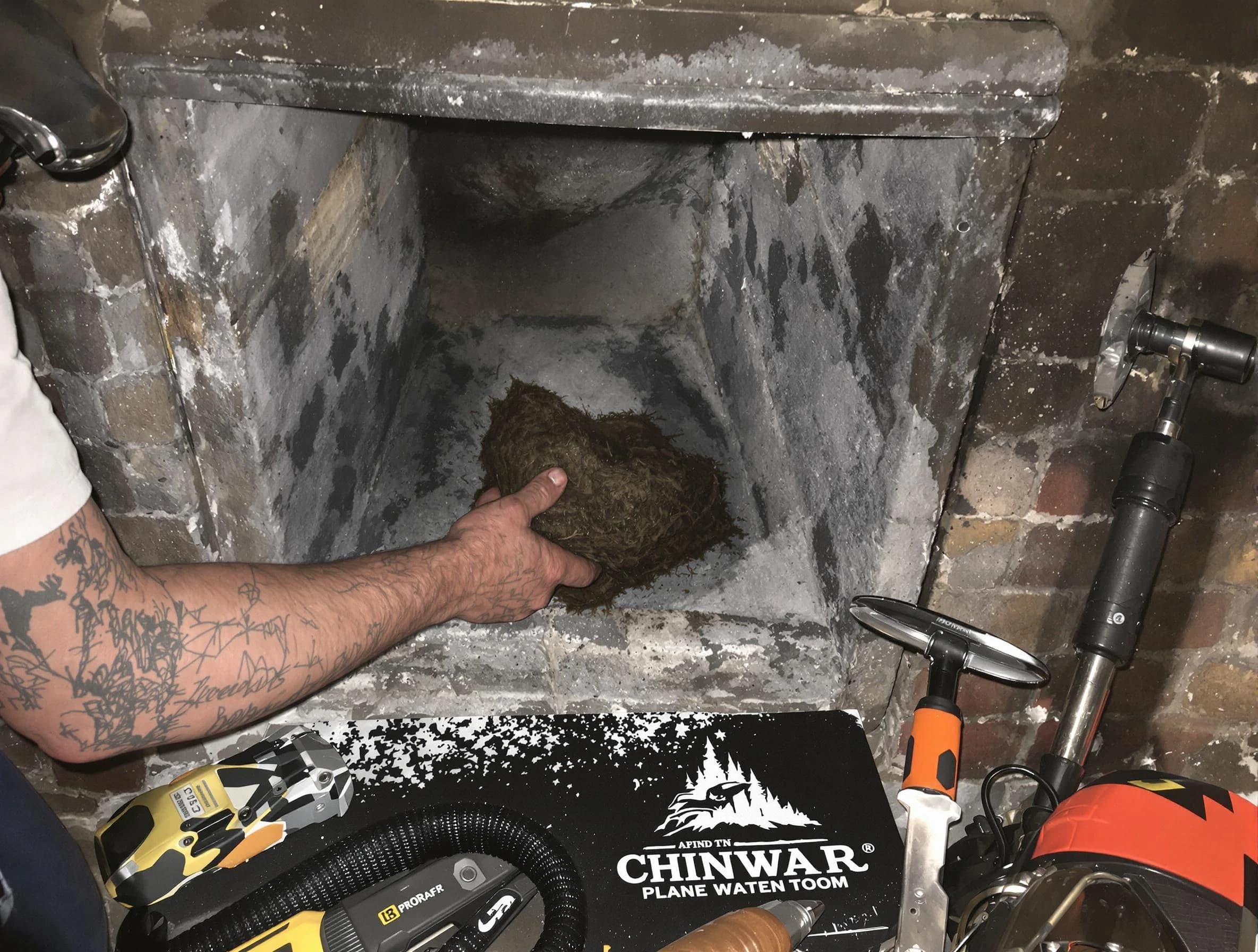 Piscataway Chimney Sweep safely removing debris and screening chimney in Piscataway, NJ